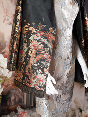 Black blazer with an ornate gold and multicolored floral print.