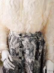 Off-white button-down midi skirt with a black and white animal print