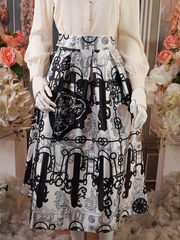 White and black patterned pleated skirt