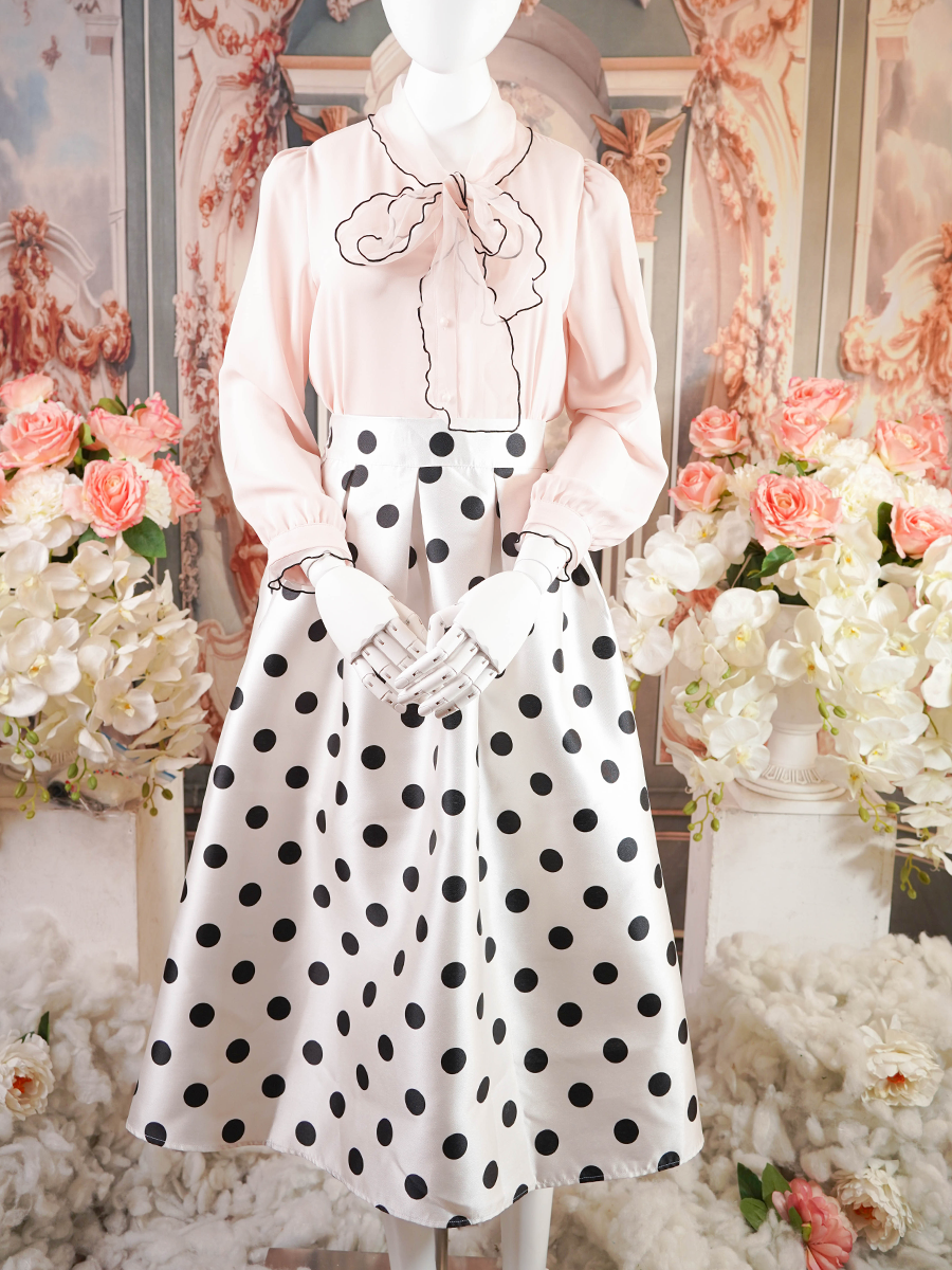 White pleated midi skirt with black polka dots