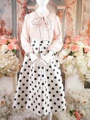 White pleated midi skirt with black polka dots