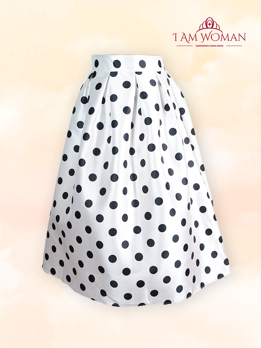 White pleated midi skirt with black polka dots