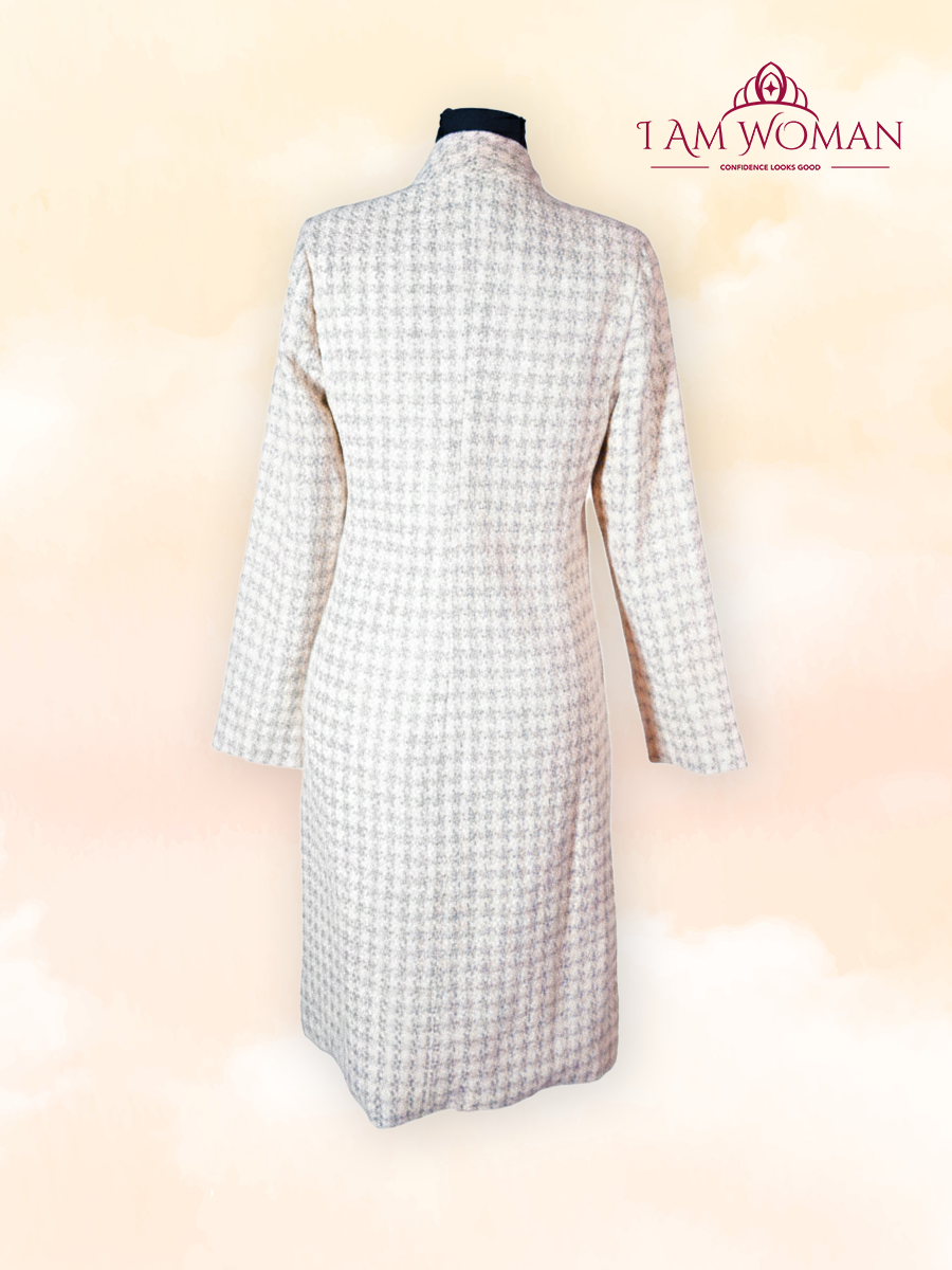 Beige houndstooth long coat.